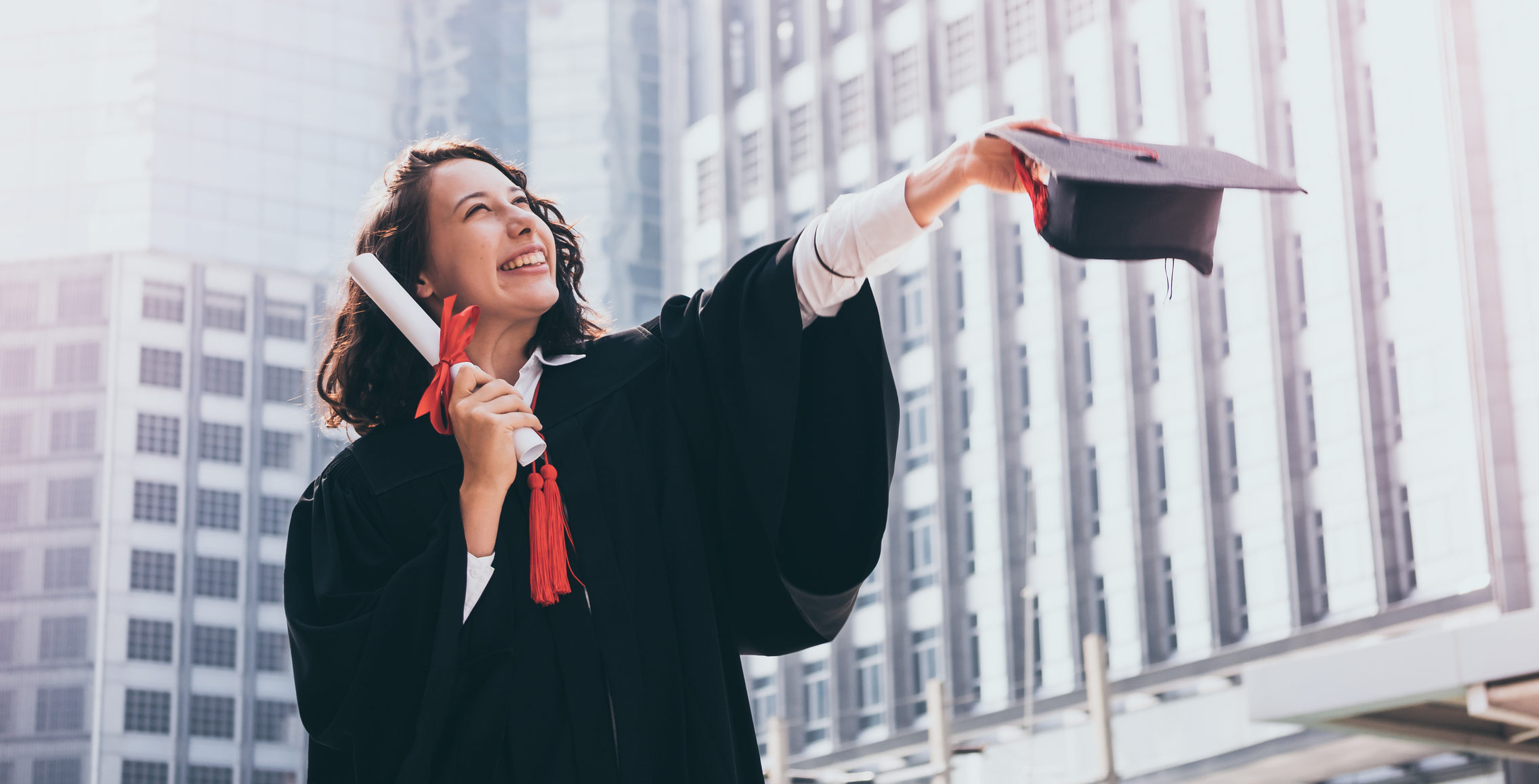 woman with graduation cap and gown
