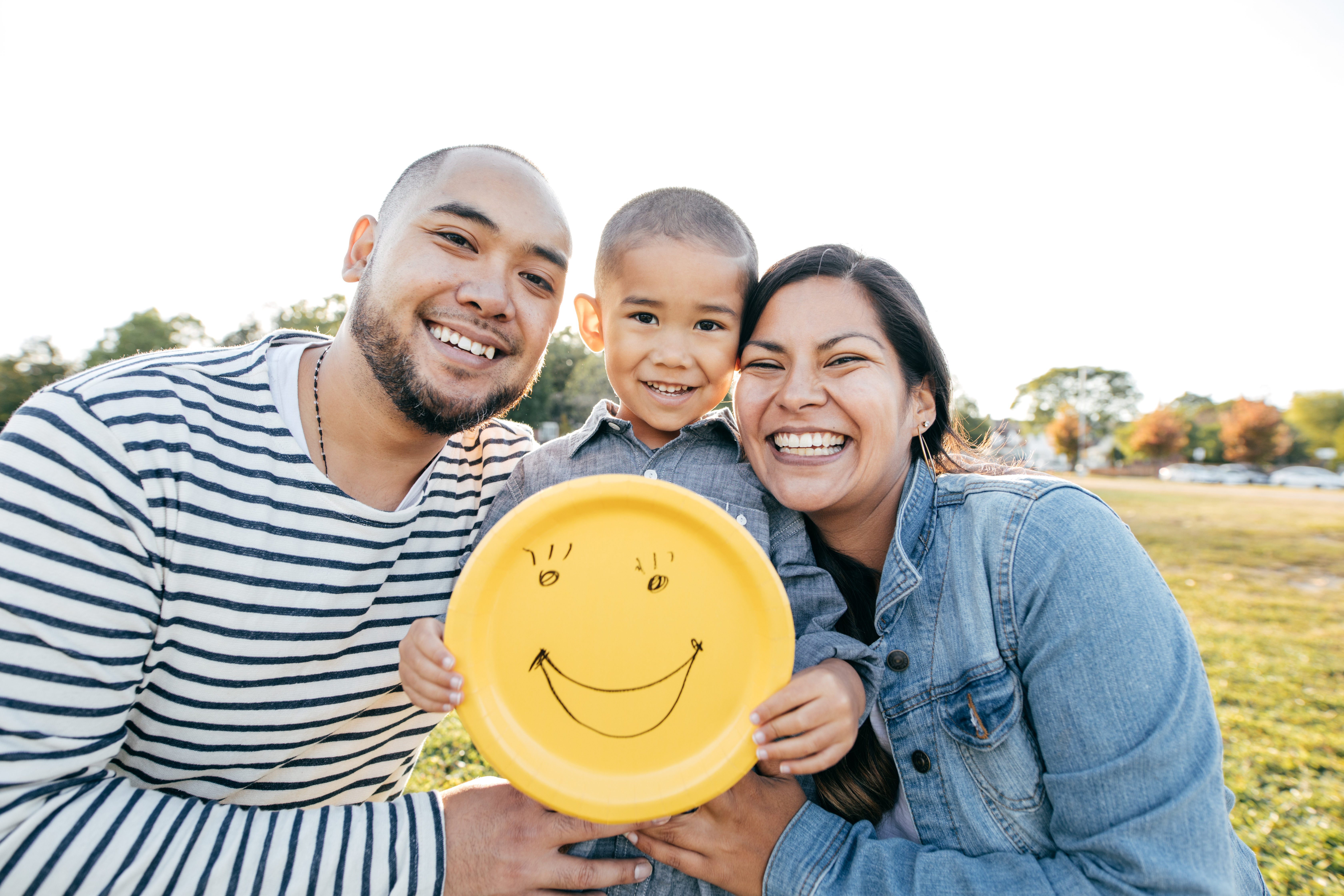 young family with kid smiling
