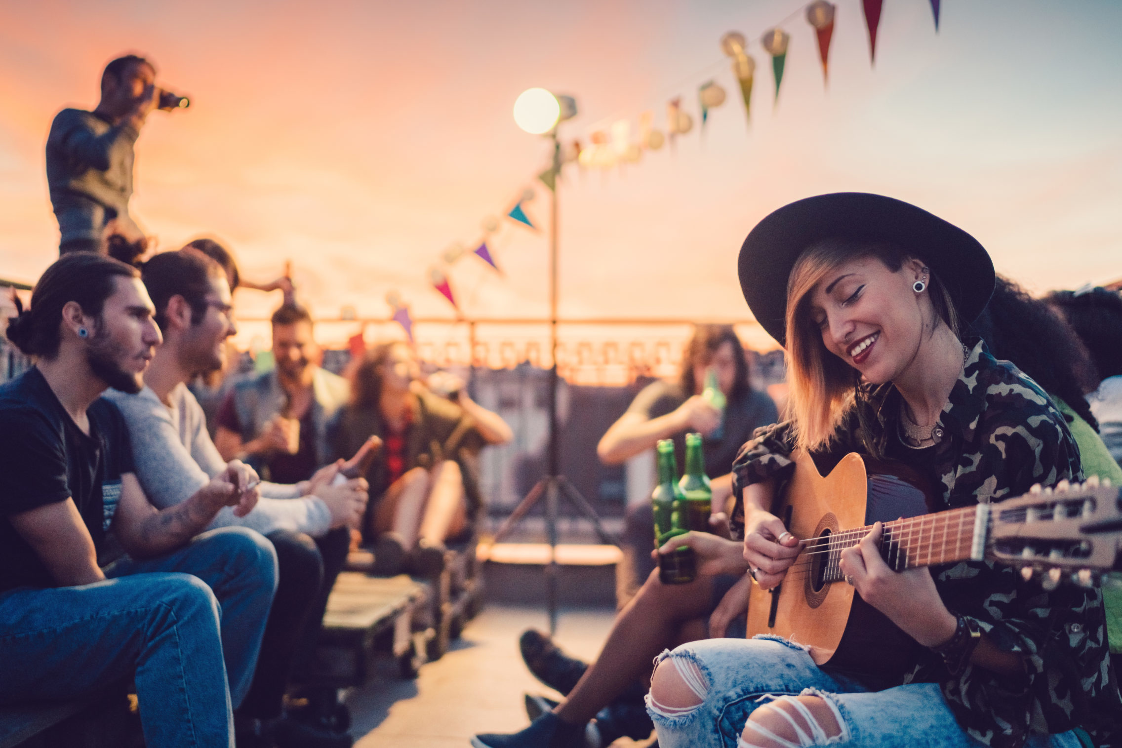 group of people at party on a rooftop