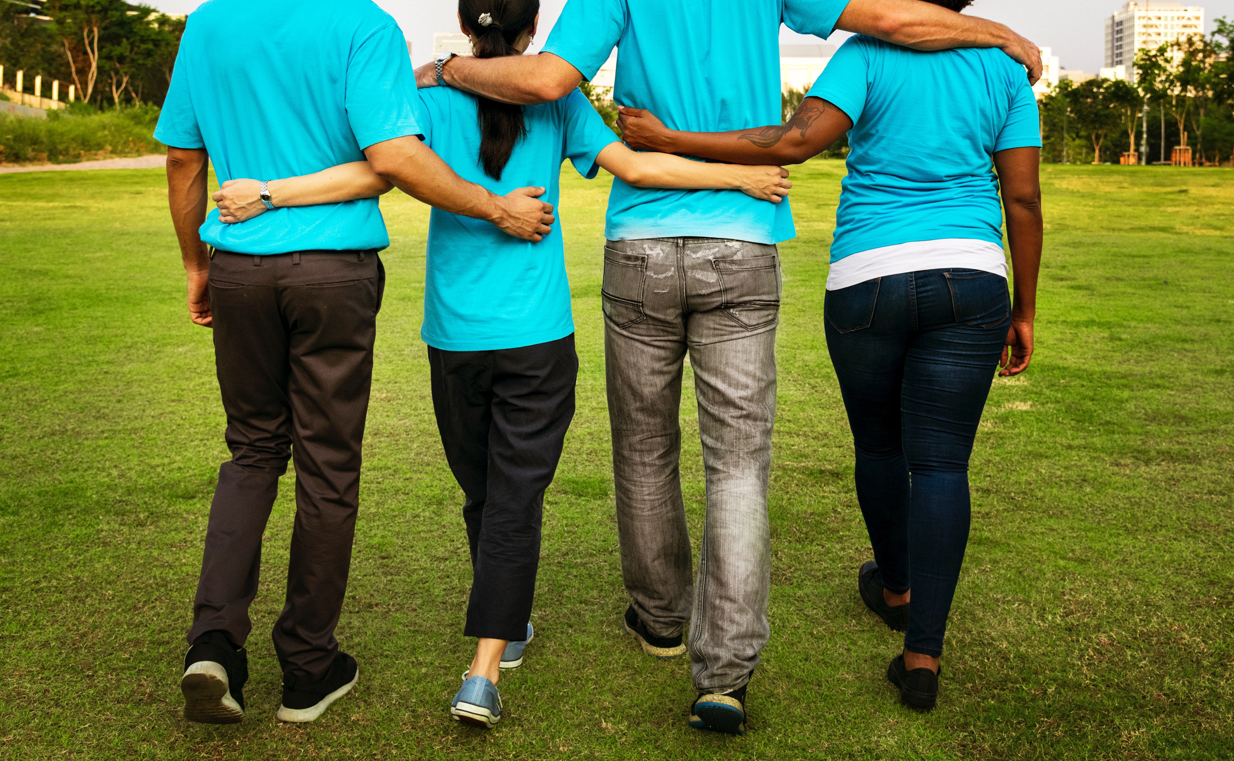 Four friends walking together