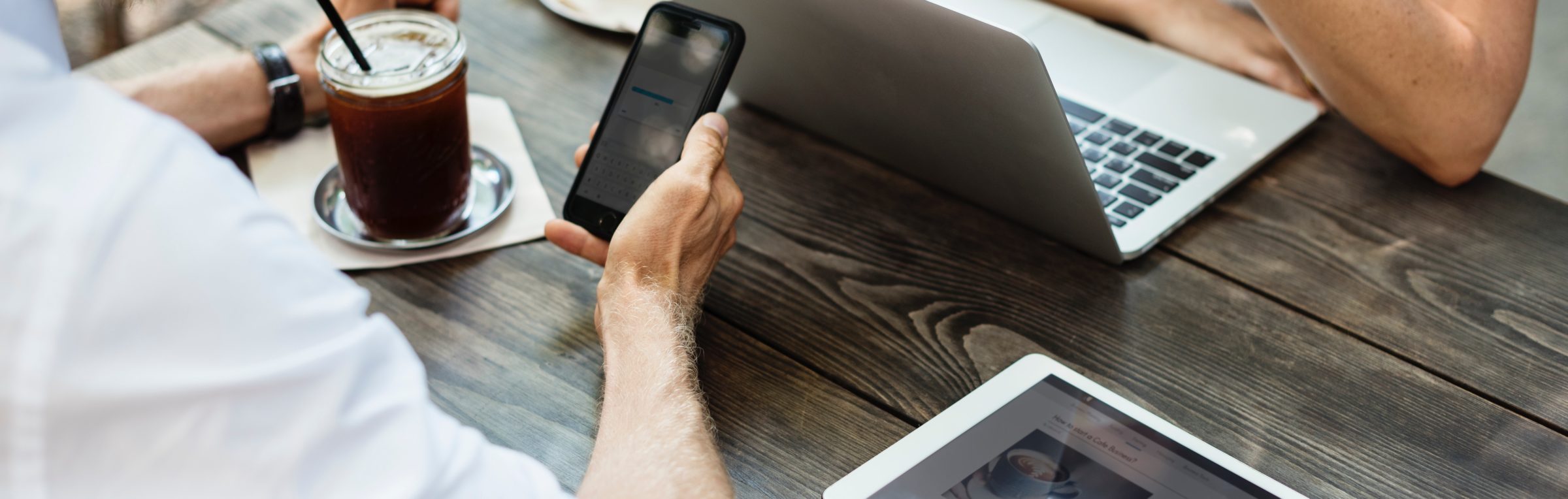 two people sitting at coffee table