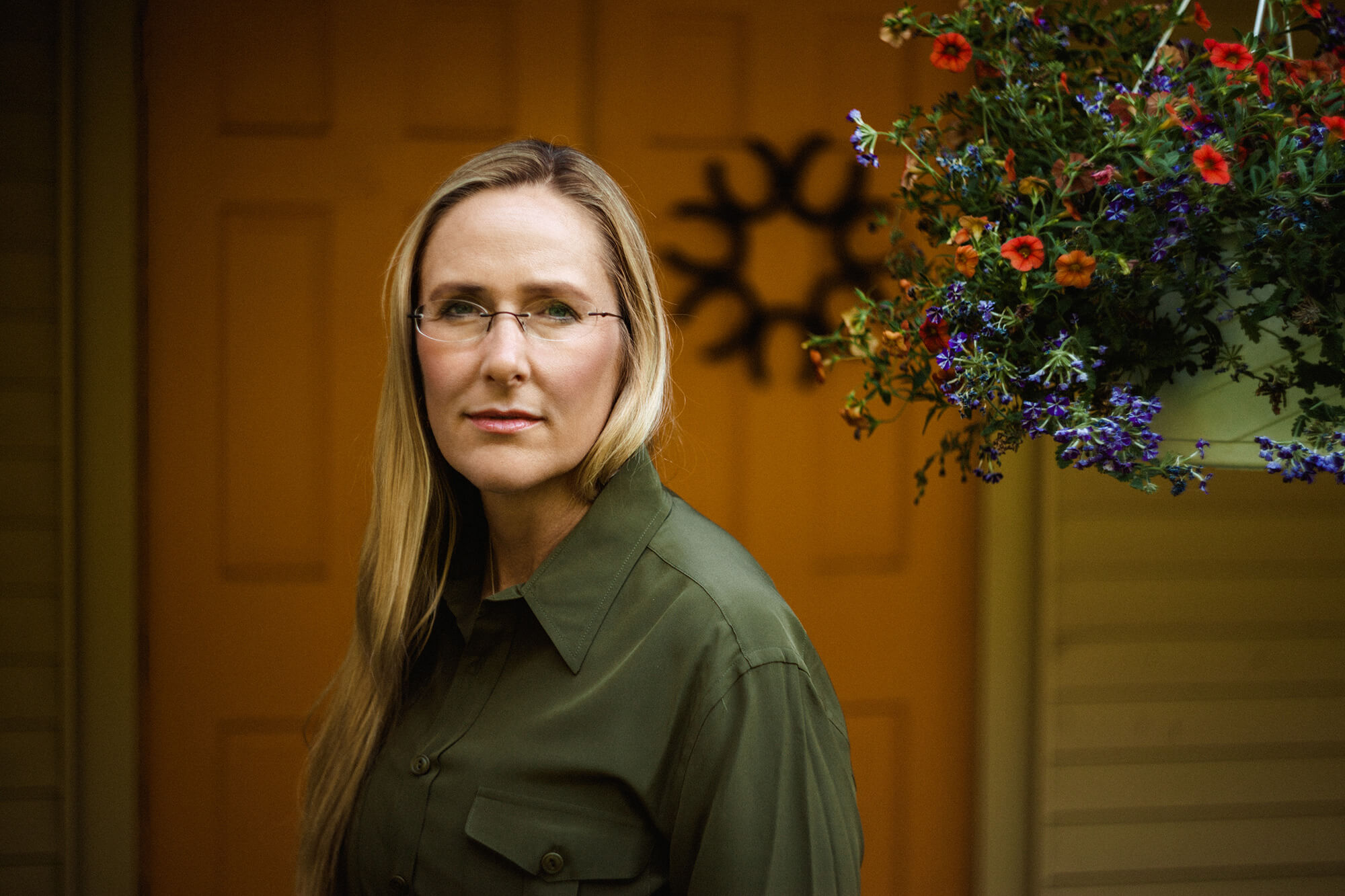 Woman standing in front of a door way