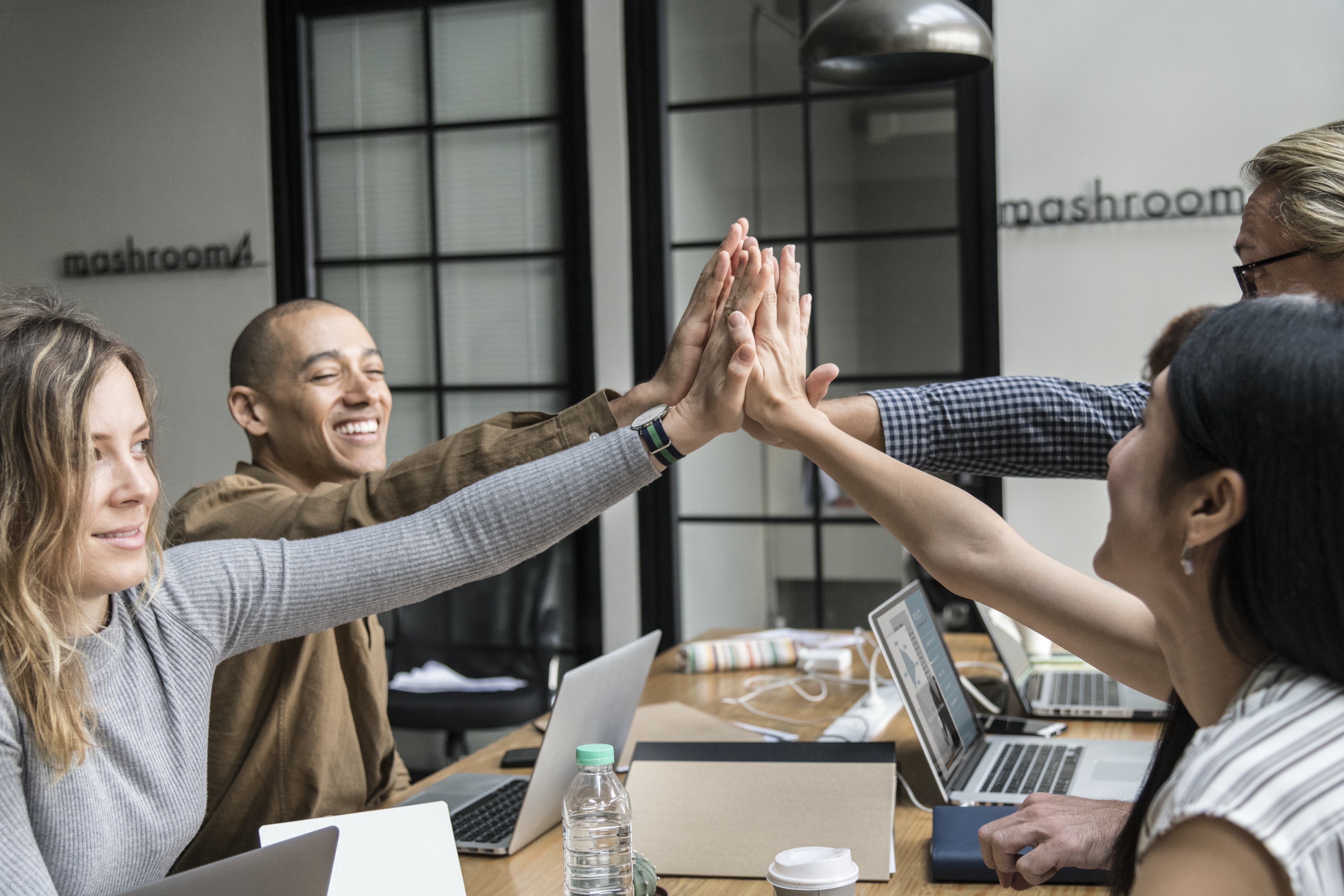 People high fiveing